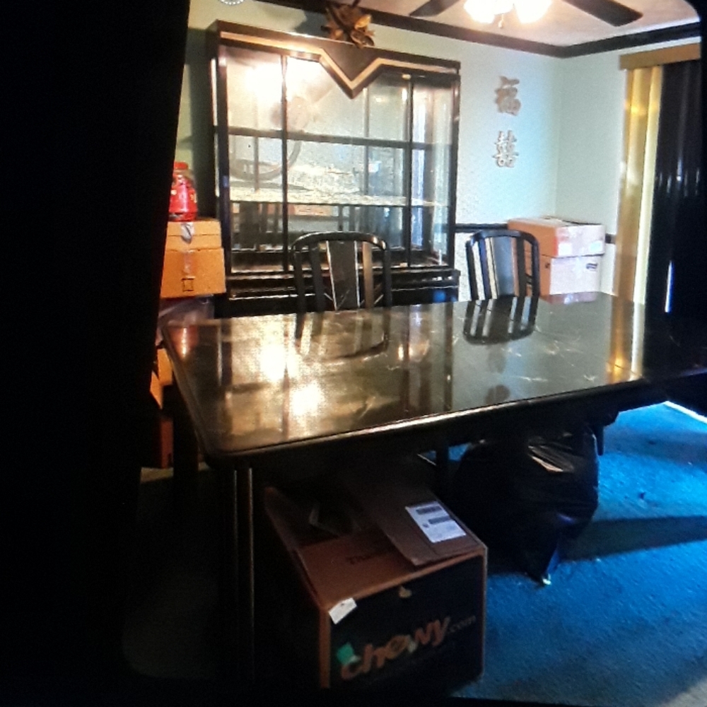 Black dining room set with 4 chairs & China closet